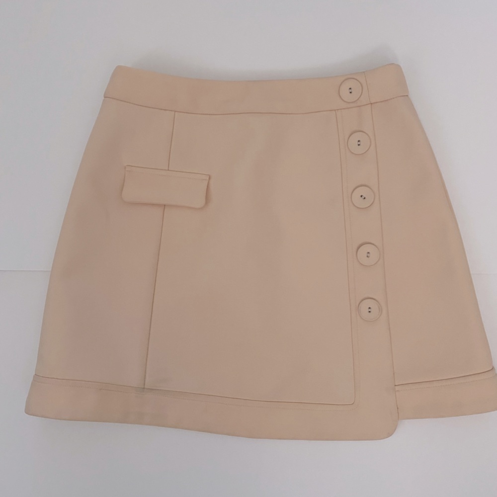 Pale pink 90s style mini skirt. Perfect for Easter.